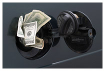 Hundred Dollar bills stuffed in a car's gas tank