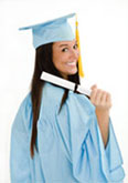 A cute female college student in graduation gown