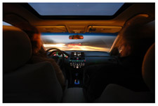 The interior of a car at night