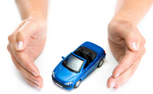 Hands enclosing a toy car