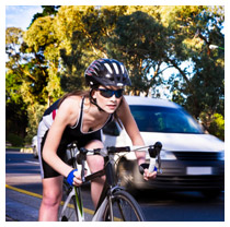 A bike and a car racing