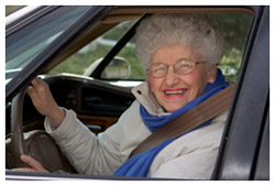 An old woman in a car