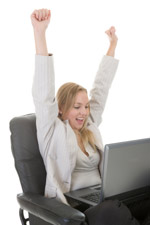 A happy woman at her computer
